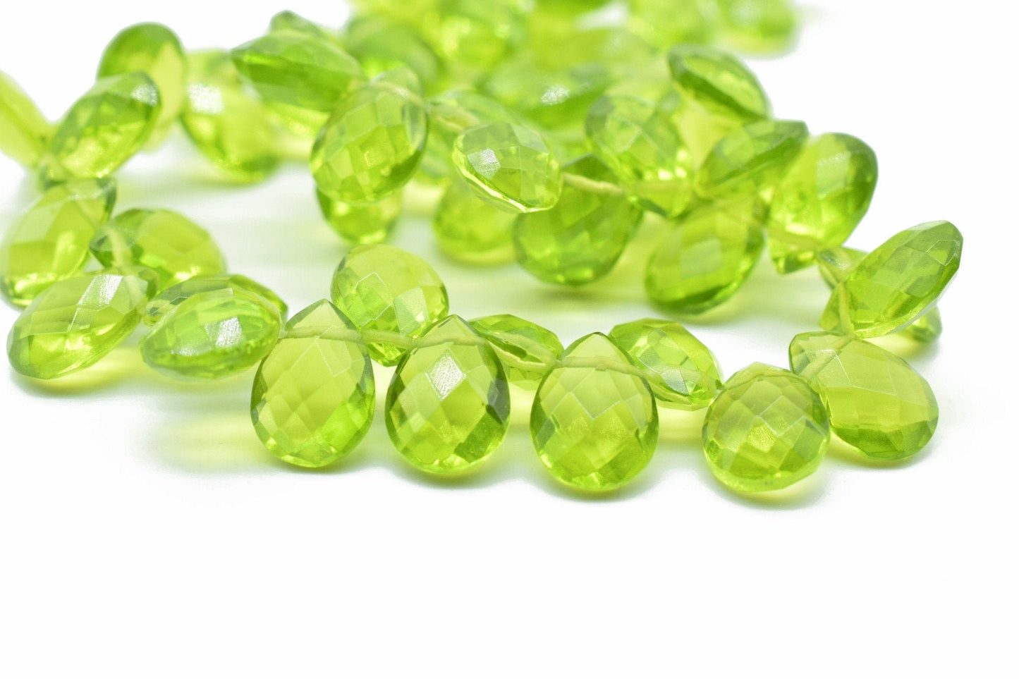 Peridot Teardrop 7x10mm Briolettes,Natural Gemstone Olive Green Peridot,Faceted Teardrop Briolettes,Drop Shape Beads for Peridot Jewelry,gif